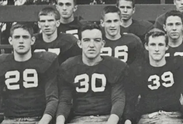 Mr. Vincent (number 30) with teammates on the school’s football team.